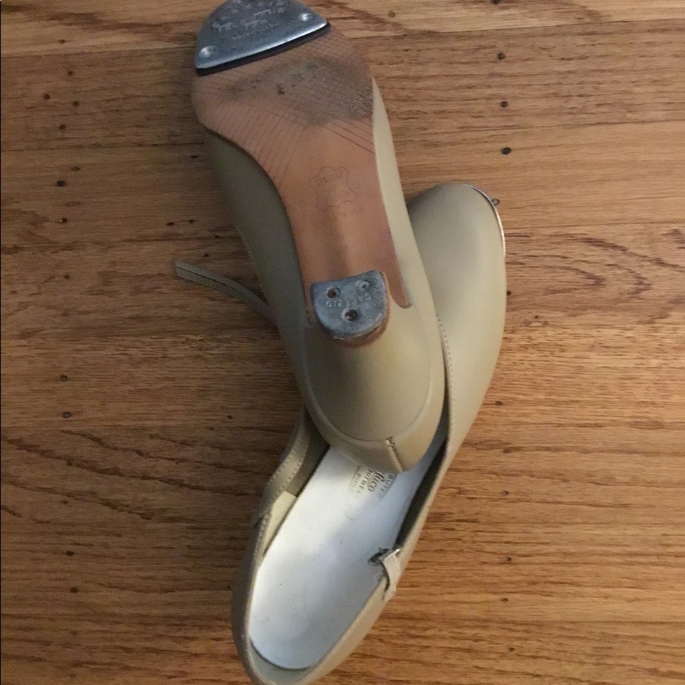 High heeled tap shoe.